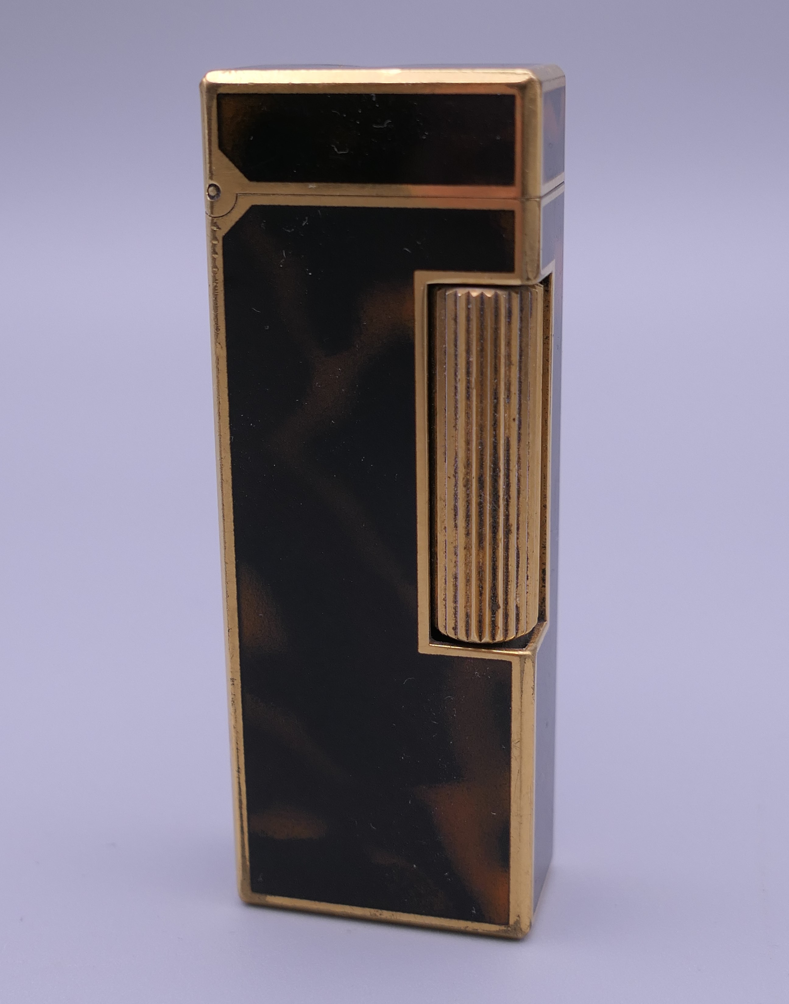A Dunhill lighter. 6 cm high. - Image 2 of 7