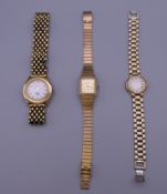 A Burberry ladies wristwatch and two others.