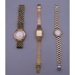 A Burberry ladies wristwatch and two others.