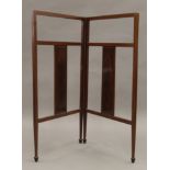 An Edwardian line inlaid mahogany folding towel rail. 52 cm wide when closed.