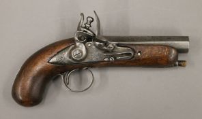 An early 19th century flint lock pocket pistol. 19 cm long.