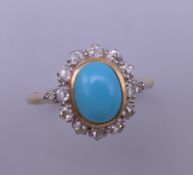 An unmarked gold, diamond and turquoise ring. Ring size P. 3.1 grammes total weight.