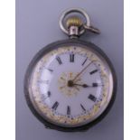 A Victorian silver fob watch.