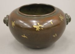 A Chinese gold splash bronze censer. 13 cm wide.