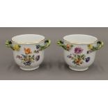 A pair of Meissen porcelain twin handled vases. Each 10.5 cm high.