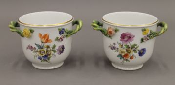 A pair of Meissen porcelain twin handled vases. Each 10.5 cm high.