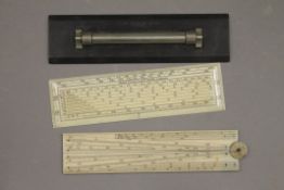 Two Victorian ivory rules and a Victorian ebony example.