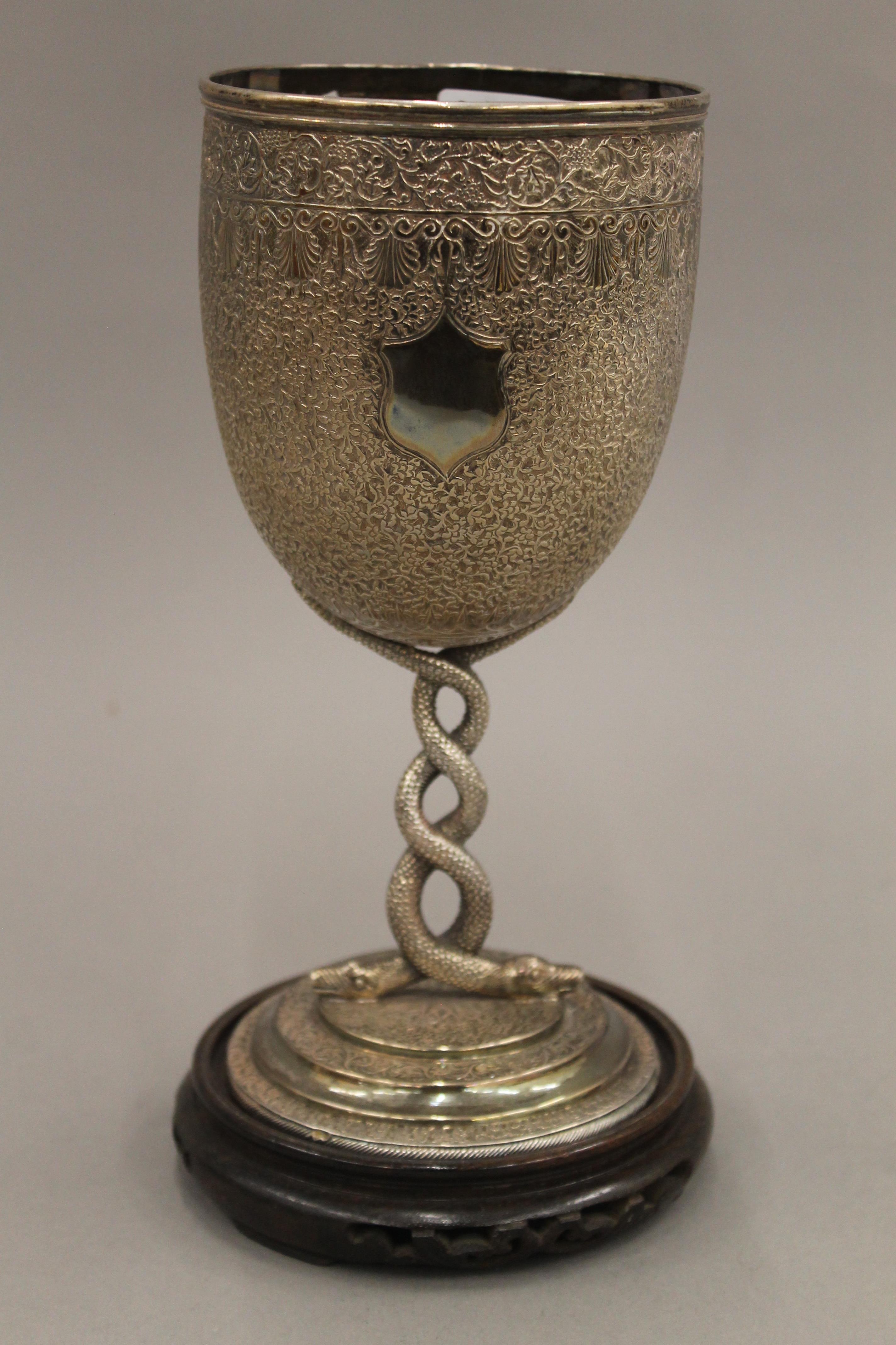 An Indian unmarked silver trophy cup. 22.5 cm high. 16.7 troy ounces.