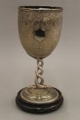 An Indian unmarked silver trophy cup. 22.5 cm high. 16.7 troy ounces.