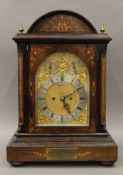 A Victorian inlaid rosewood cased striking bracket clock,