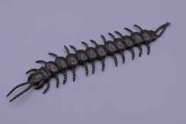 A Japanese bronze articulated model of a centipede. 15 cm long.