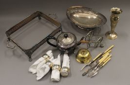 A box of various metalware.