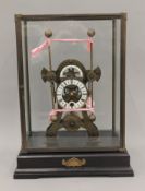 A grasshopper clock. 50 cm high.