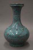 A Chinese vase, the underside with impressed seal mark. 31 cm high.