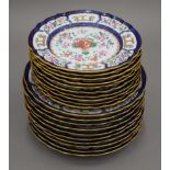 Twenty 19th century Armorially decorated porcelain plates. The larger each 24 cm diameter.
