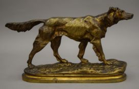 A patinated bronze animalier sculpture modelled as a dog. 32 cm long.