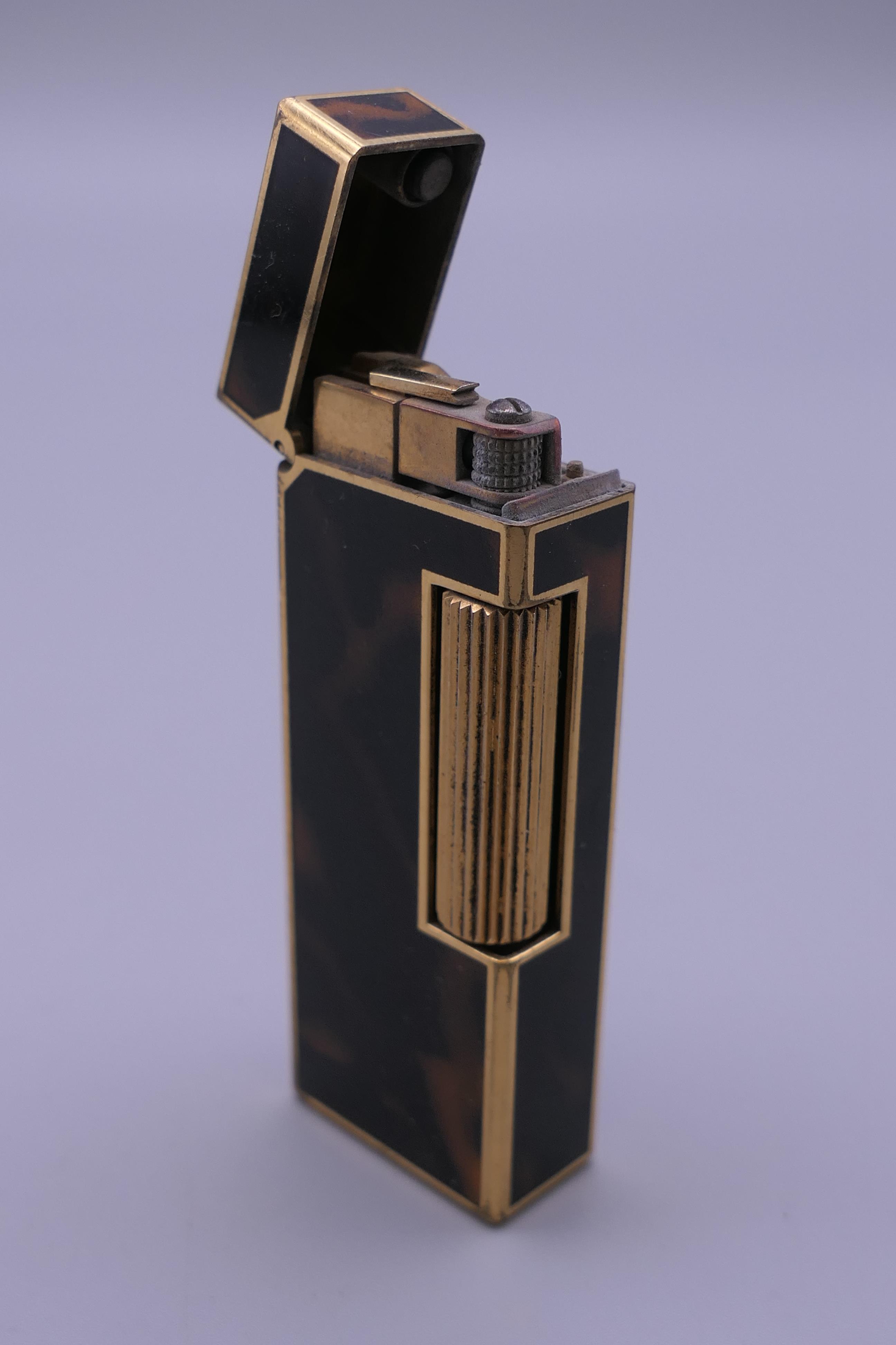 A Dunhill lighter. 6 cm high. - Image 3 of 7