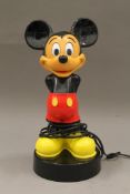 A 1988 Mickey Mouse phone. 25.5 cm high.