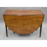 A 19th century mahogany drop leaf table. 108 cm wide x 162 cm long.