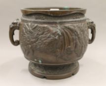 A 19th century Japanese bronze jardiniere, signed. 34 cm wide.