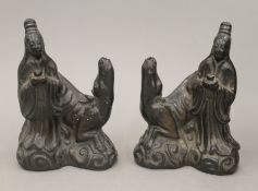 A pair of 18th/19th century Chinese figural pottery water droppers. 17 cm high.