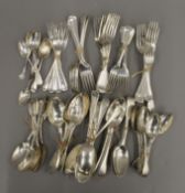 A quantity of silver and plated cutlery.