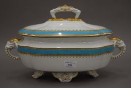 A Royal Worcester gilt heightened porcelain tureen. 40 cm wide.