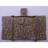 A small brass religious triptych. 6.5 cm high.