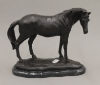 A bronze model of a horse. 22 cm high.