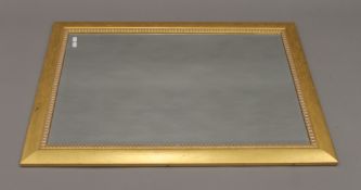 A large gilt framed mirror. 105.5 x 75 cm.