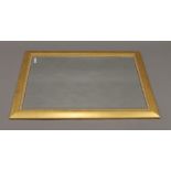 A large gilt framed mirror. 105.5 x 75 cm.