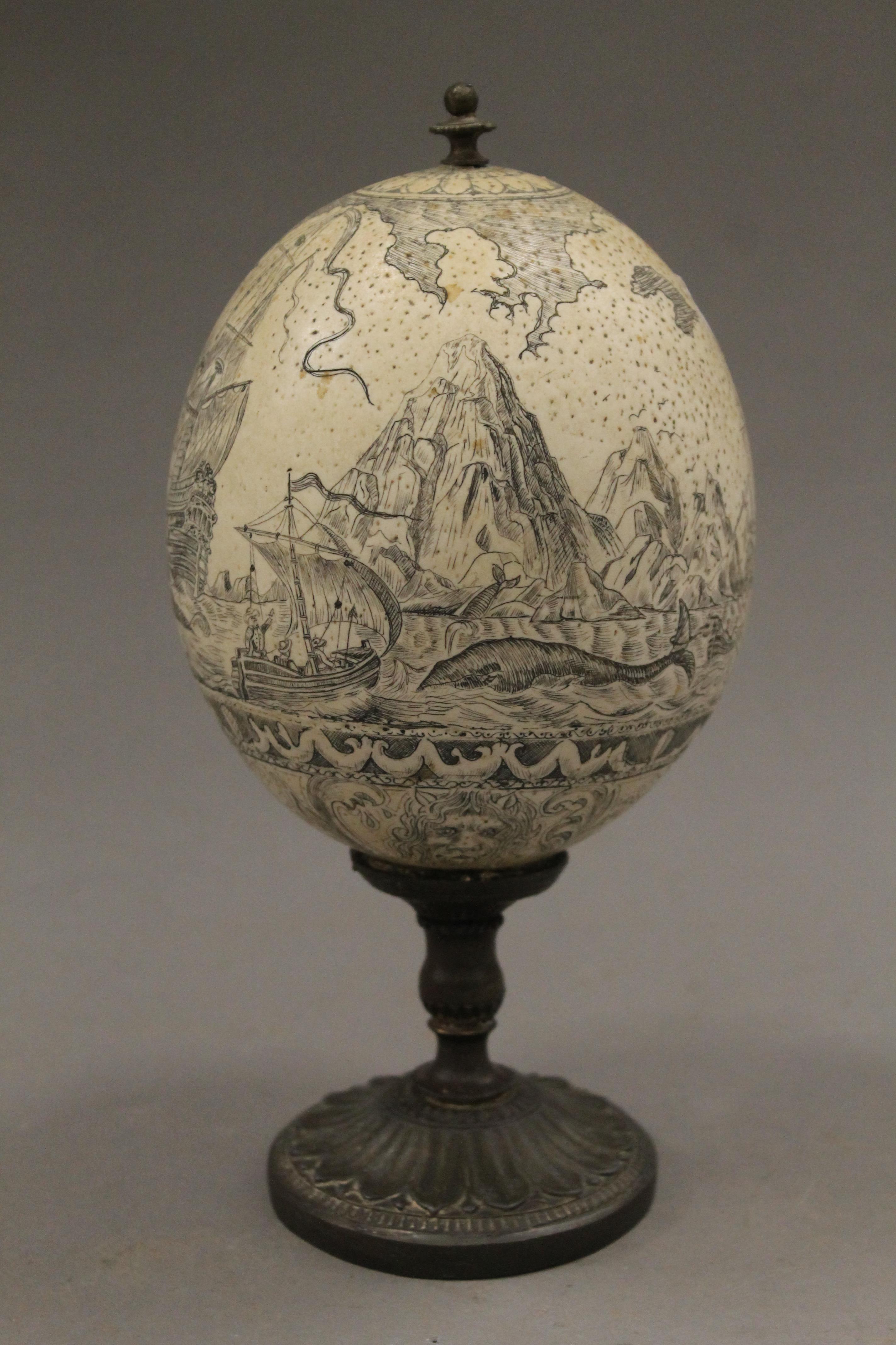 A carved and mounted ostrich egg. 23 cm high. - Image 4 of 5