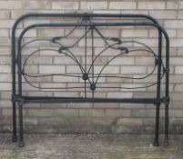 A Victorian iron bed.