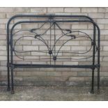 A Victorian iron bed.