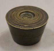 A set of six antique brass cup weights. 3 cm high.
