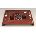 An Oriental table/food warmer. 54 cm long.