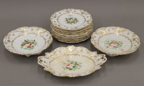 A Victorian gilt heightened florally decorated part dessert service.