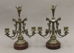 A pair of 19th century bronze and rouge marble candelabra. 32 cm high.