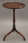 A small mahogany tripod table. 44 cm diameter.