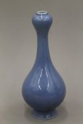 A small Chinese blue porcelain onion top vase. 16.5 cm high.