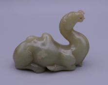 A Chinese jade carving of a camel. 8.5 cm long.