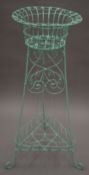 A Victorian wirework plant stand. 86 cm high.