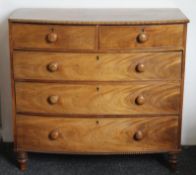 An early 19th century bowfront chest of drawers. 106 cm wide.