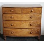 An early 19th century bowfront chest of drawers. 106 cm wide.