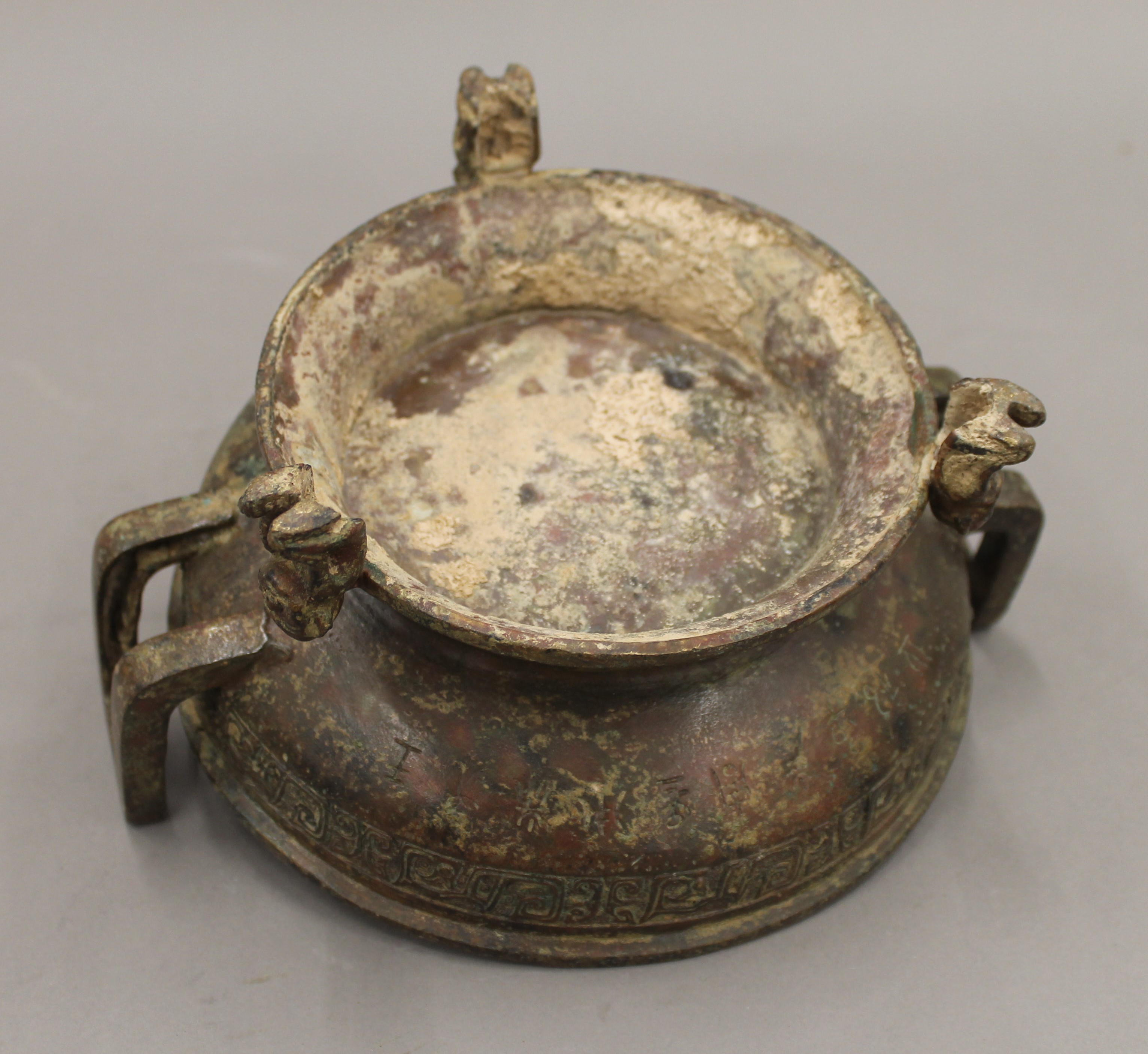 A Chinese archaist style bronze censer. 24 cm wide. - Image 5 of 5