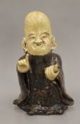 A Chinese pottery model of Shou Lao. 28 cm high.