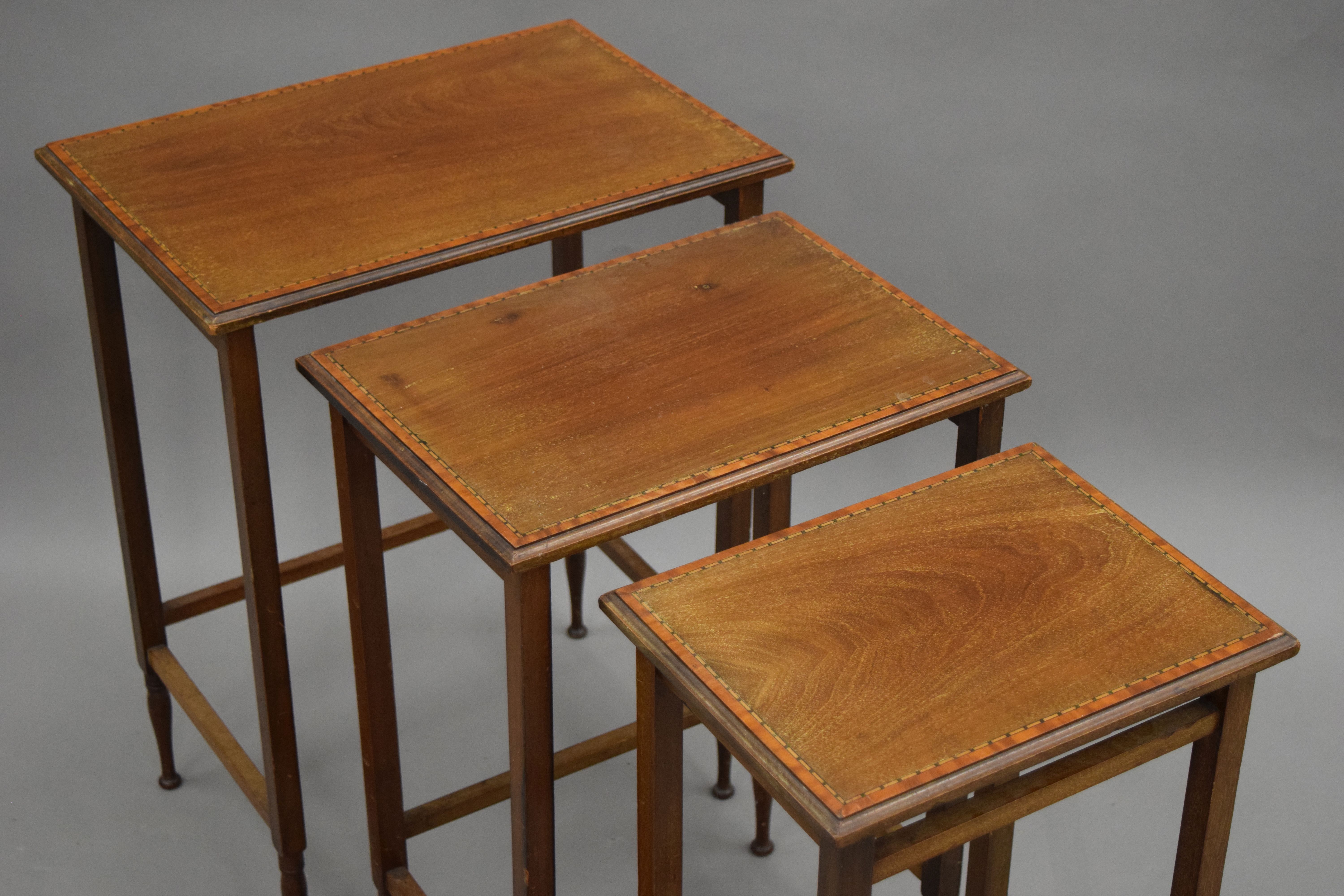 An Edwardian mahogany nest of three tables. 49 cm wide. - Image 3 of 4