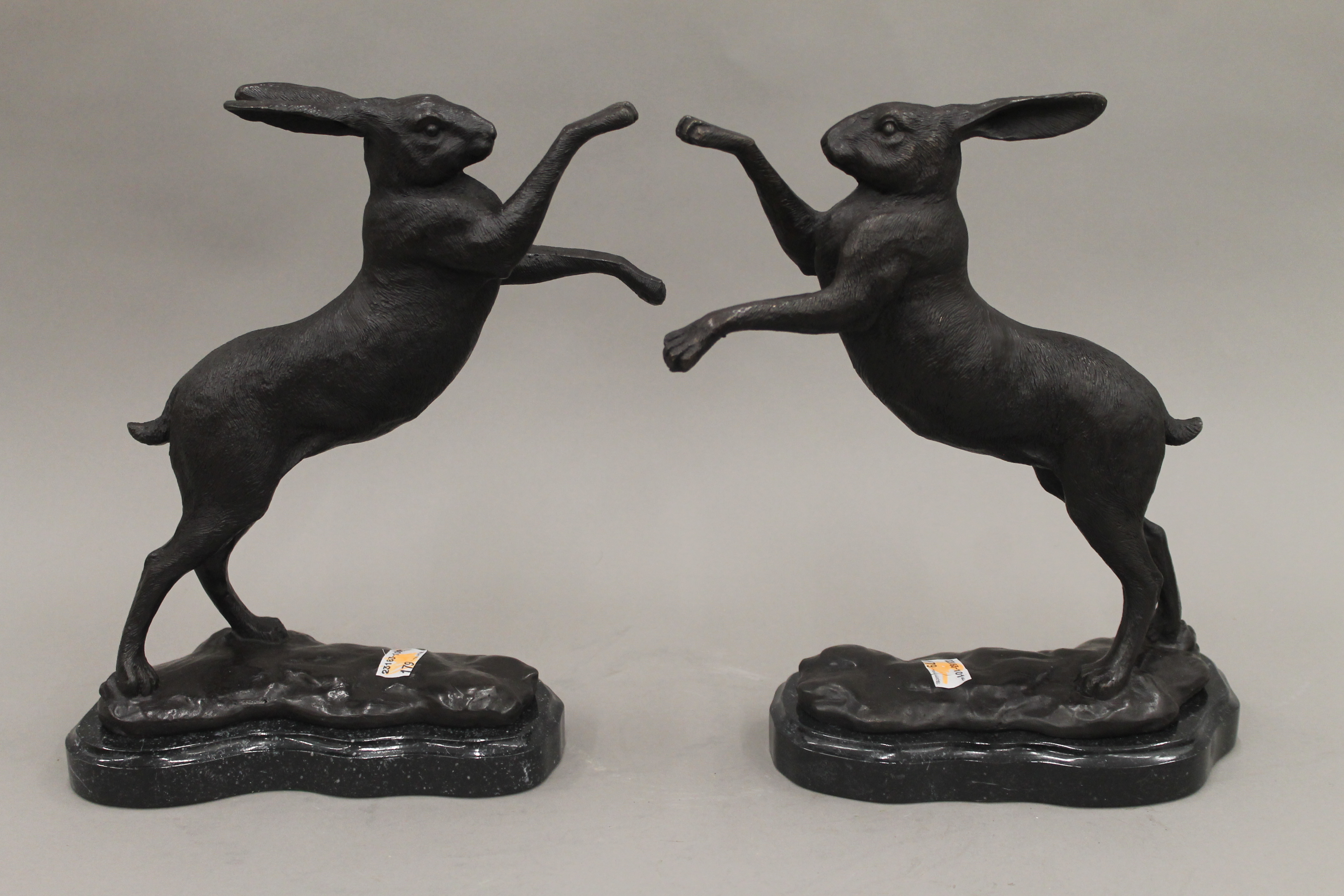 A pair of bronze boxing hares. 29 cm high.