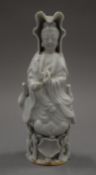 A small Chinese blanc de chine model of Guanyin. 14 cm high.