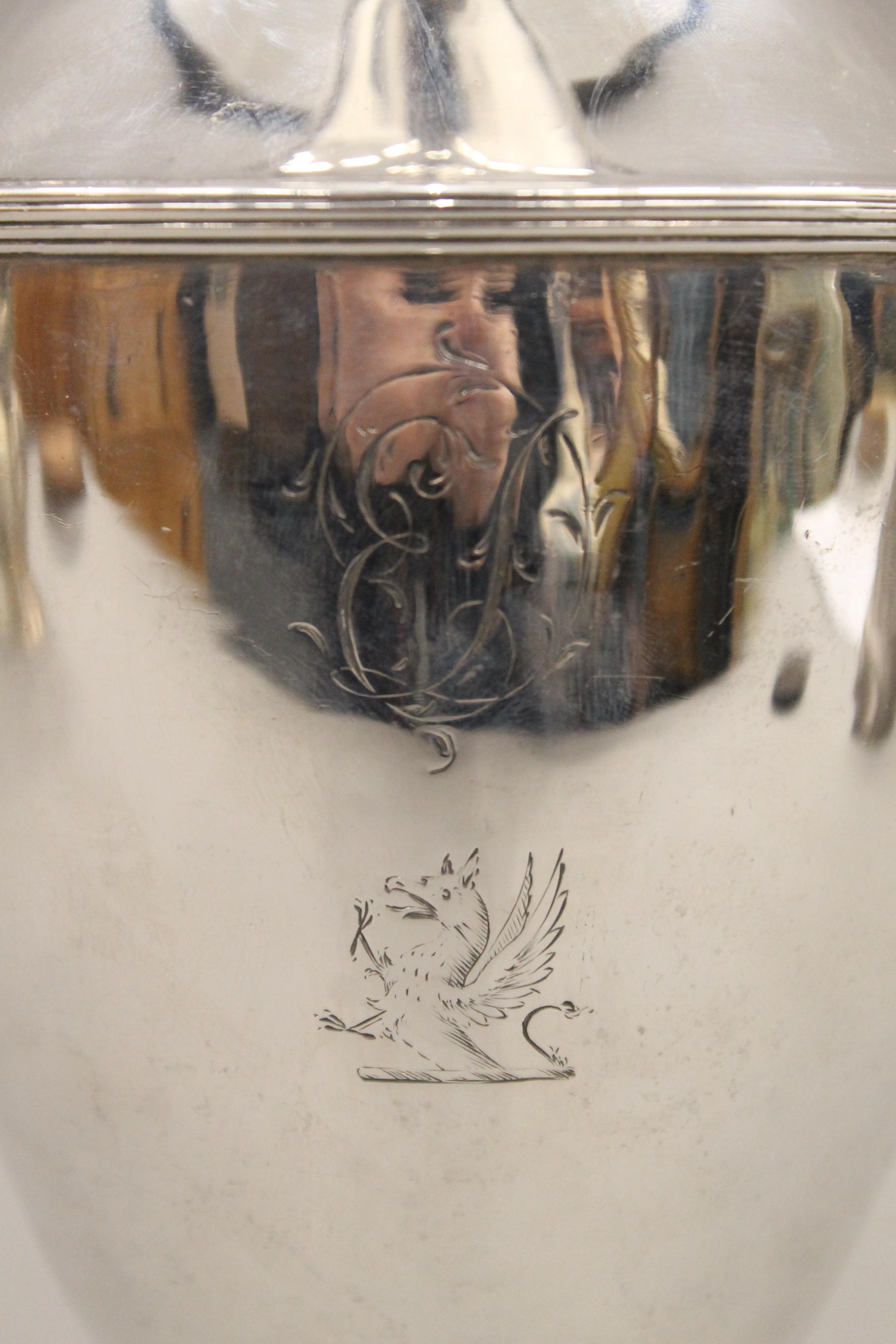 A Georgian silver hot water jug, makers mark of Hester Bateman. 31.5 cm high. 19. - Image 3 of 5